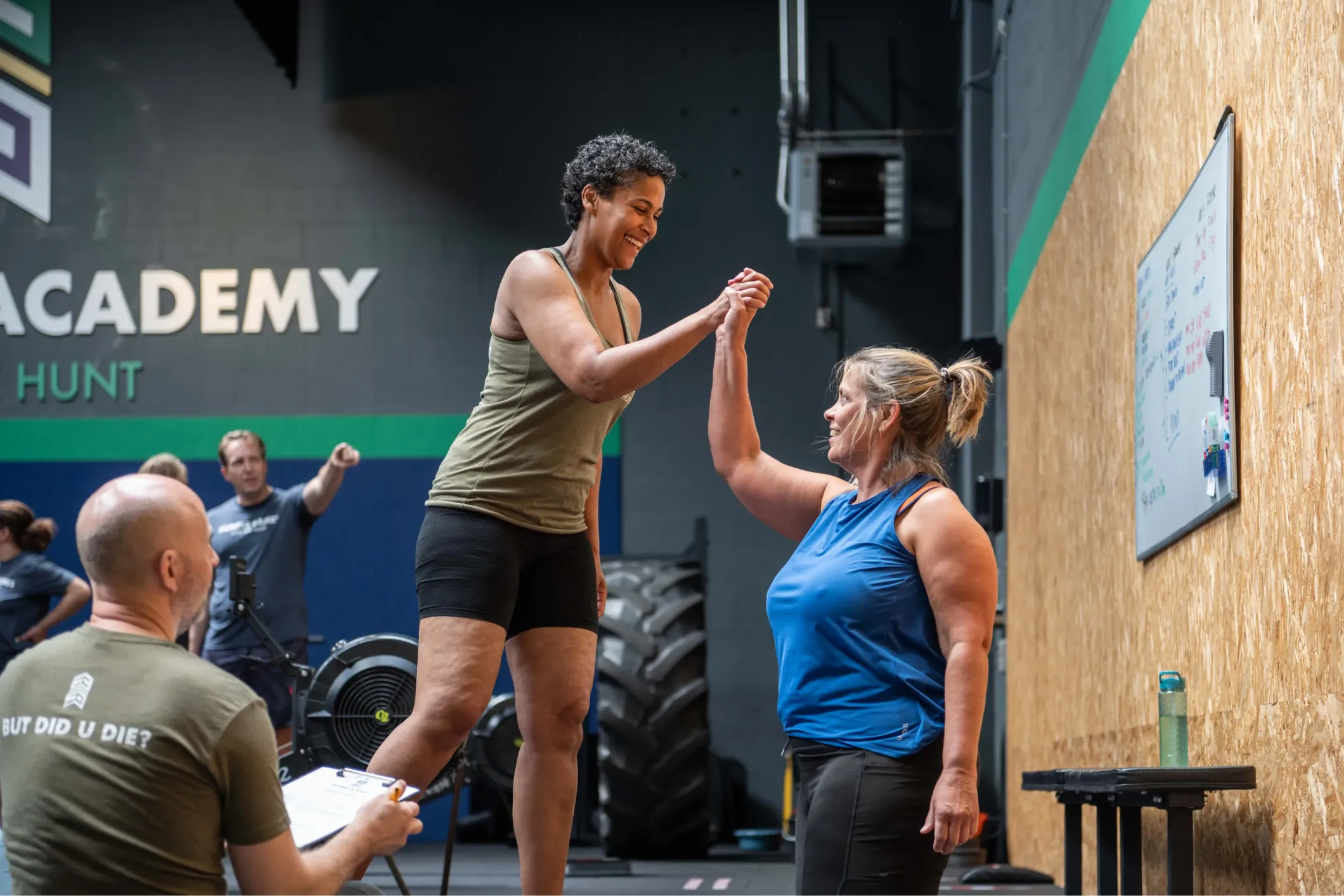 Event photo of a high five at Hunter's Academy CrossFit