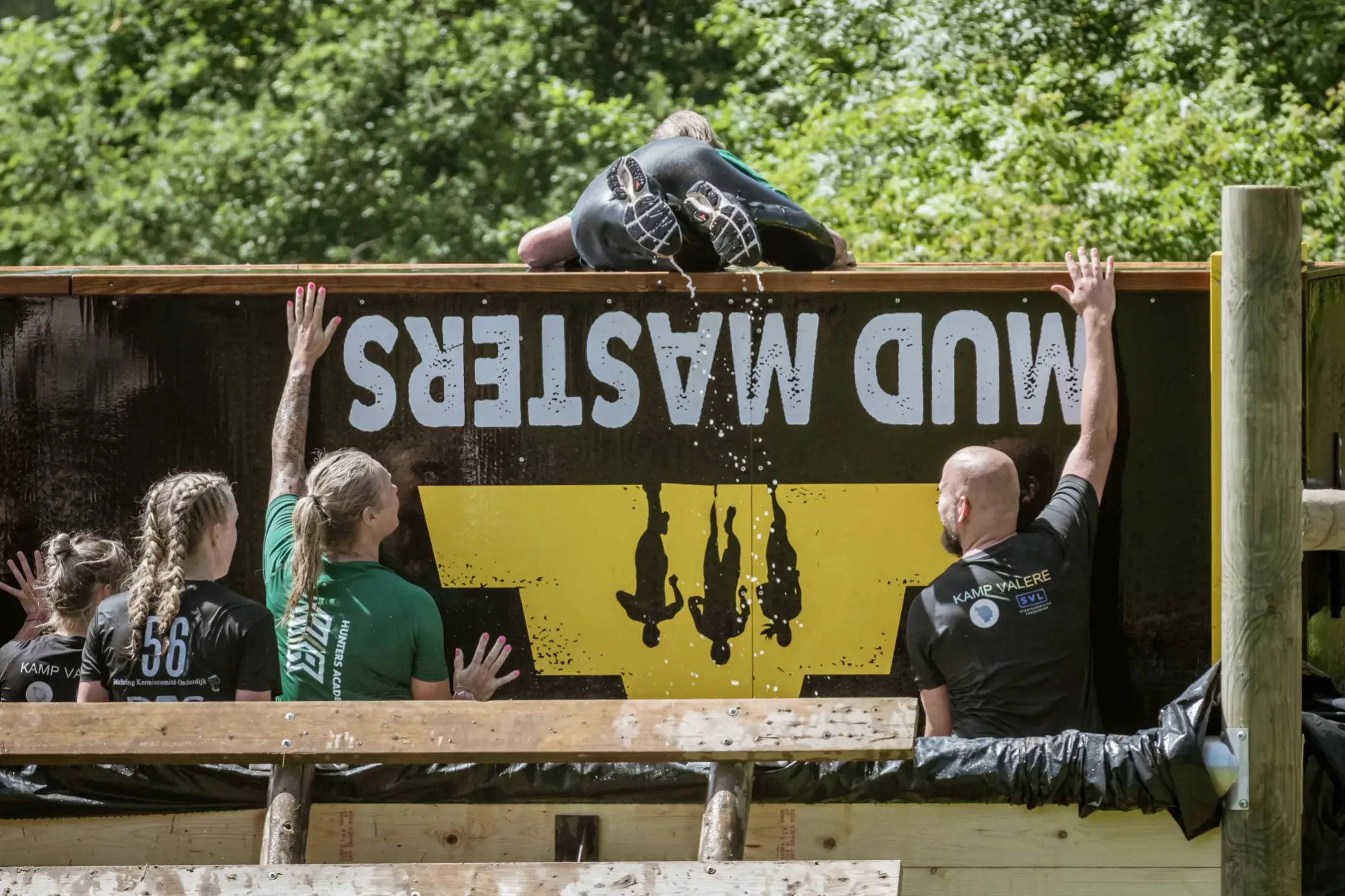 Event photo of climbing obstacles at Mud Masters