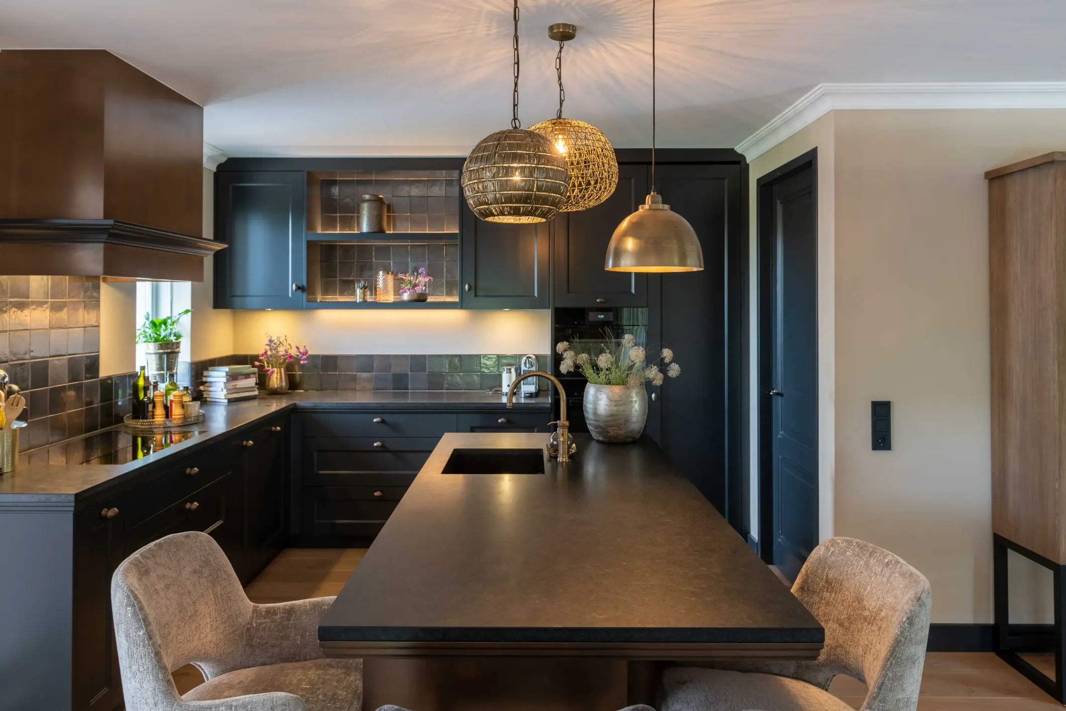 Interior photo of a kitchen table under lamps
