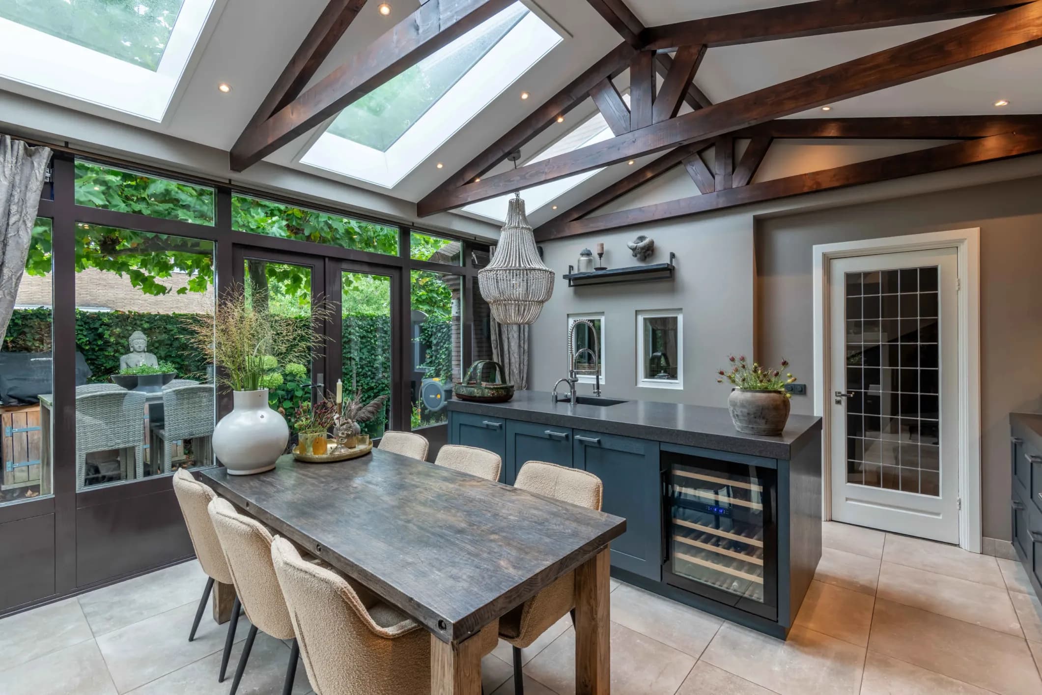 Interior photo of a kitchen table and a blue worktop