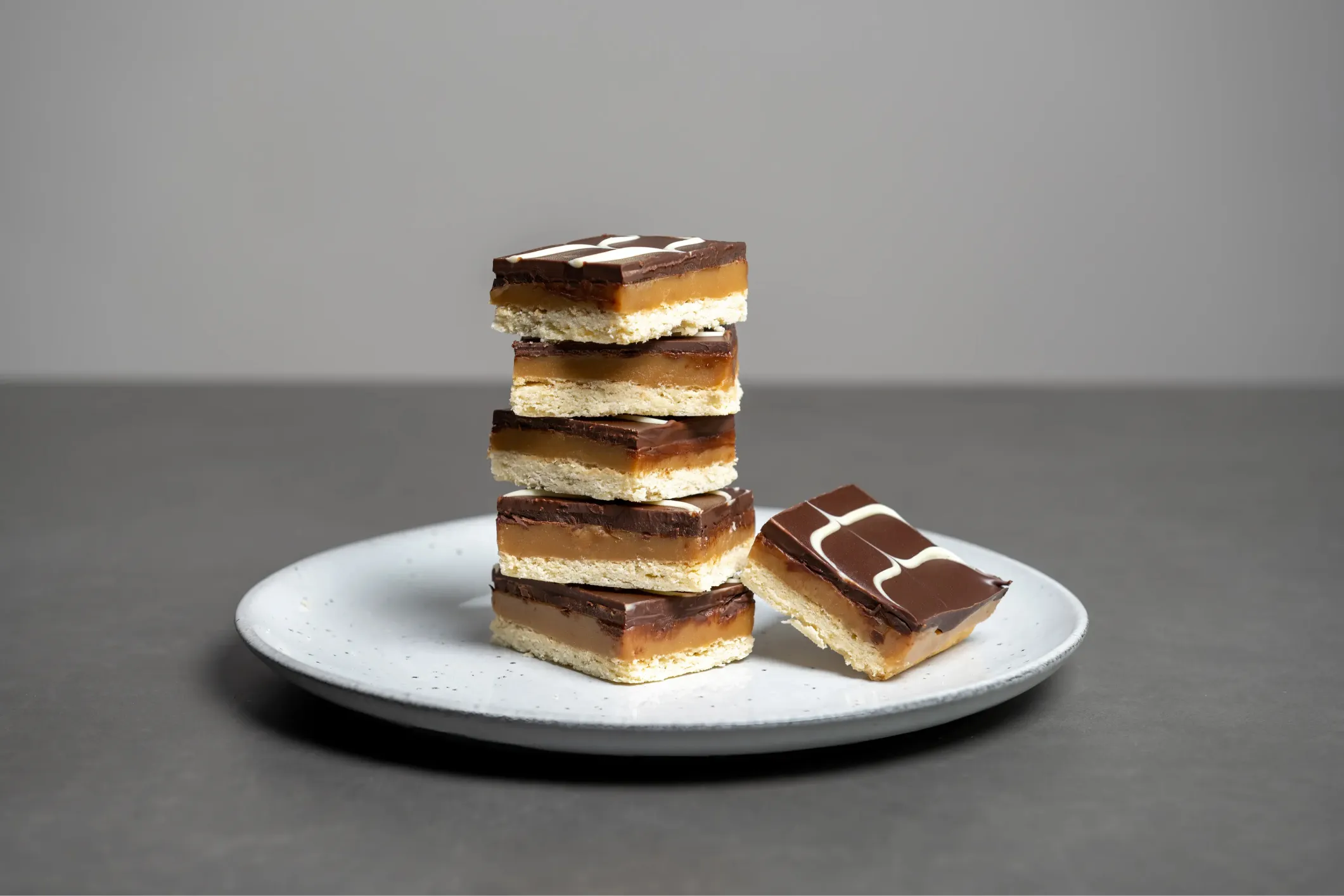 Product photo of chocolate shortbreads on a white plate